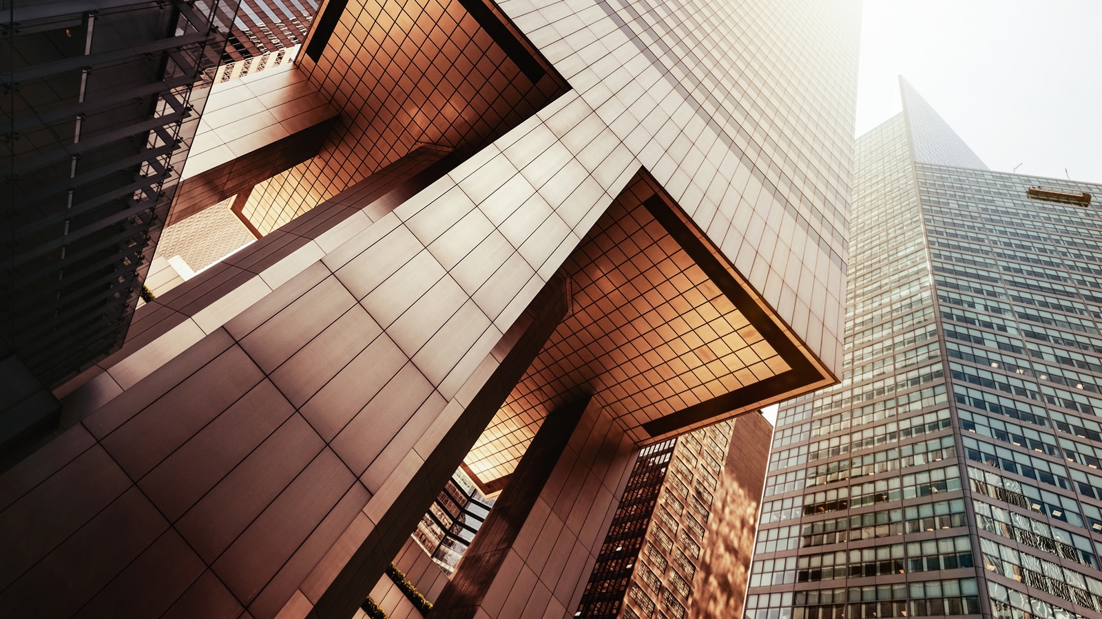 Office skyscraper reflection in the sunlight.